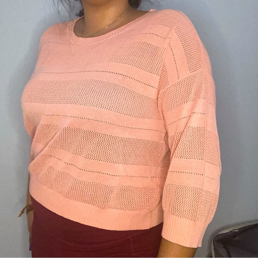 Pink knitted sweater